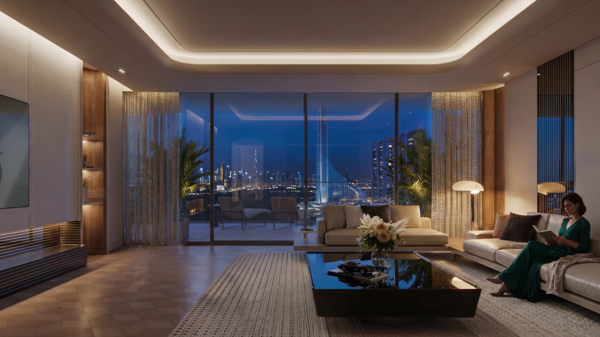 Living room at night with floor-to-ceiling windows over the city