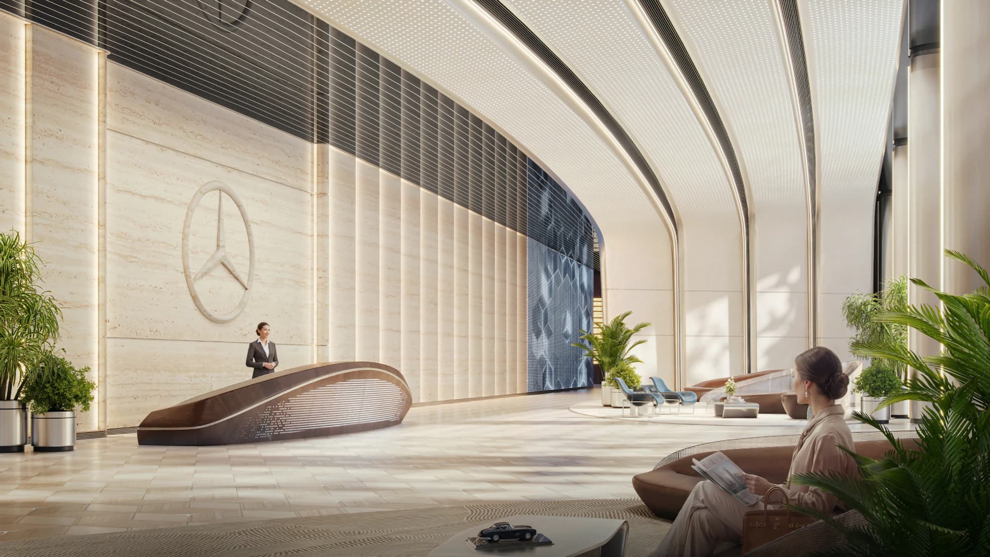 Arrival lobby with the Mercedes-Benz star on a ribbed stone wall